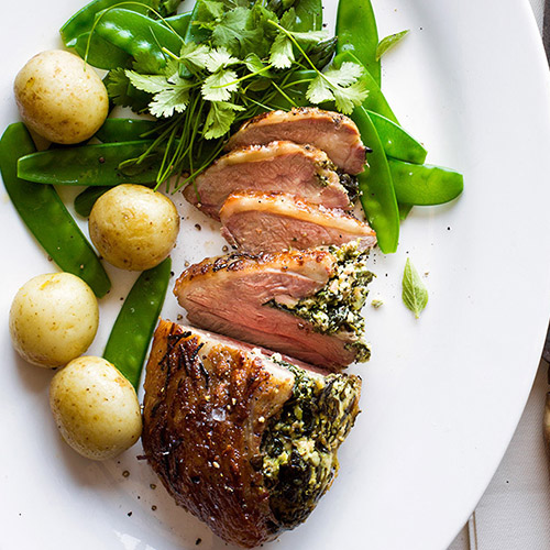 Coastal lamb rump roast with tender greens and hollandaise sauce