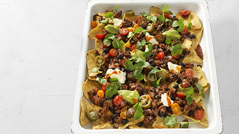 Tray bake nachos with guacamole