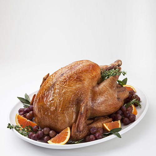 Roast turkey with pecan and orange stuffing