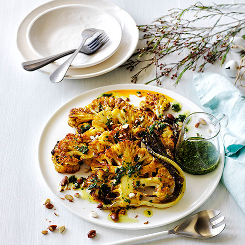 Cauliflower steaks with almonds and parsley dressing