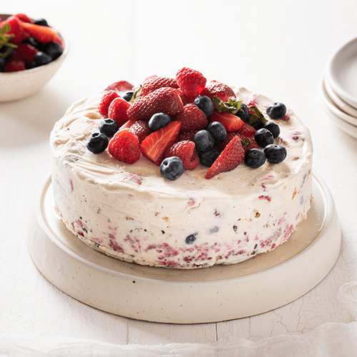 Chocolate cookie and berry ice cream cake