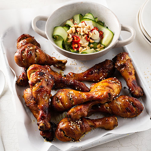 Indonesian style chicken drumsticks with roast peanut and cucumber salad
