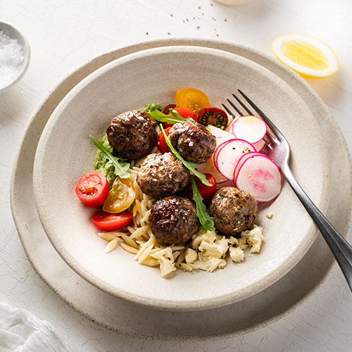 Greek style meatballs with green dressing