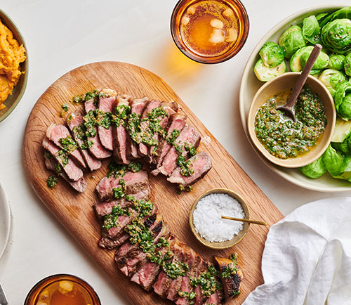 Sirloin steak with salsa verde and kūmara mash