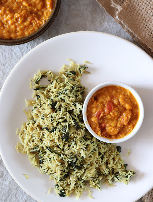 Spinach biryani with coconut lentil curry