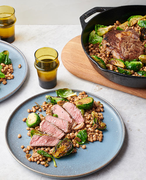 Ultimate steak with Brussels sprouts and cannellini beans