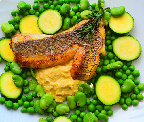 Leigh skin on snapper fillets with greens and hummus 