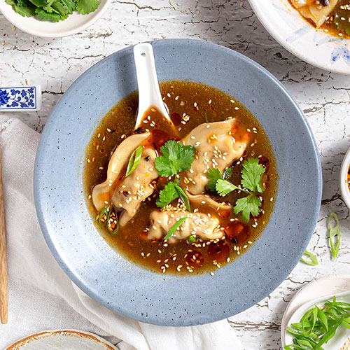 Sichuan-inspired spicy dumpling soup