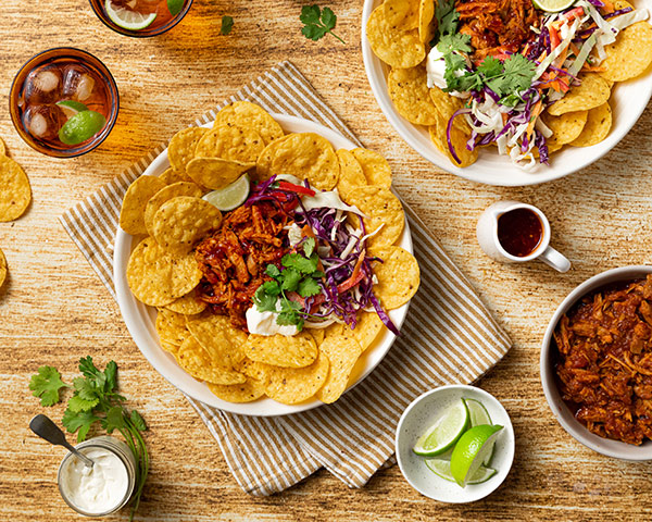 Smoky pulled pork nachos and coleslaw