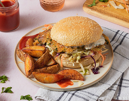 Crumbed beef schnitzel and slaw burgers