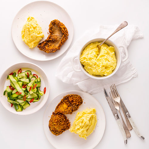 Beef schnitzel with creamy mash and quick pickled cucumber
